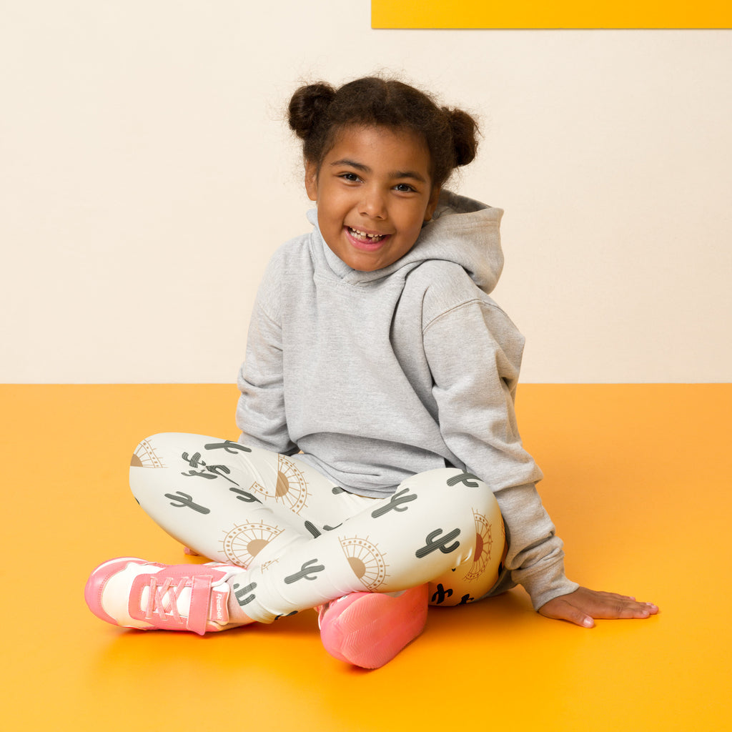Gray hooded sweatshirt with a soft casual fit and ribbed cuffs, paired with kids cactus desert sunrise buttery soft leggings