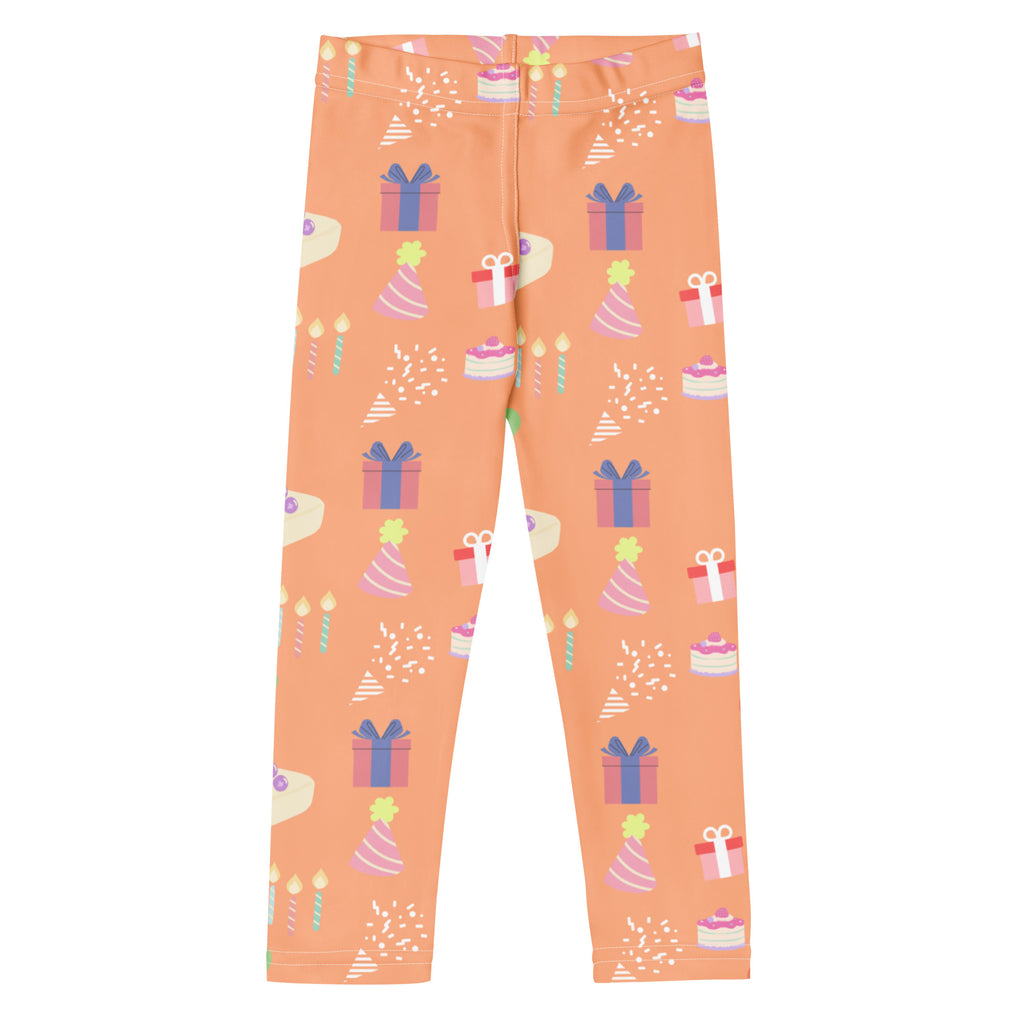 Kids orange birthday pattern buttery soft leggings with colorful gifts cakes and party hats playful design