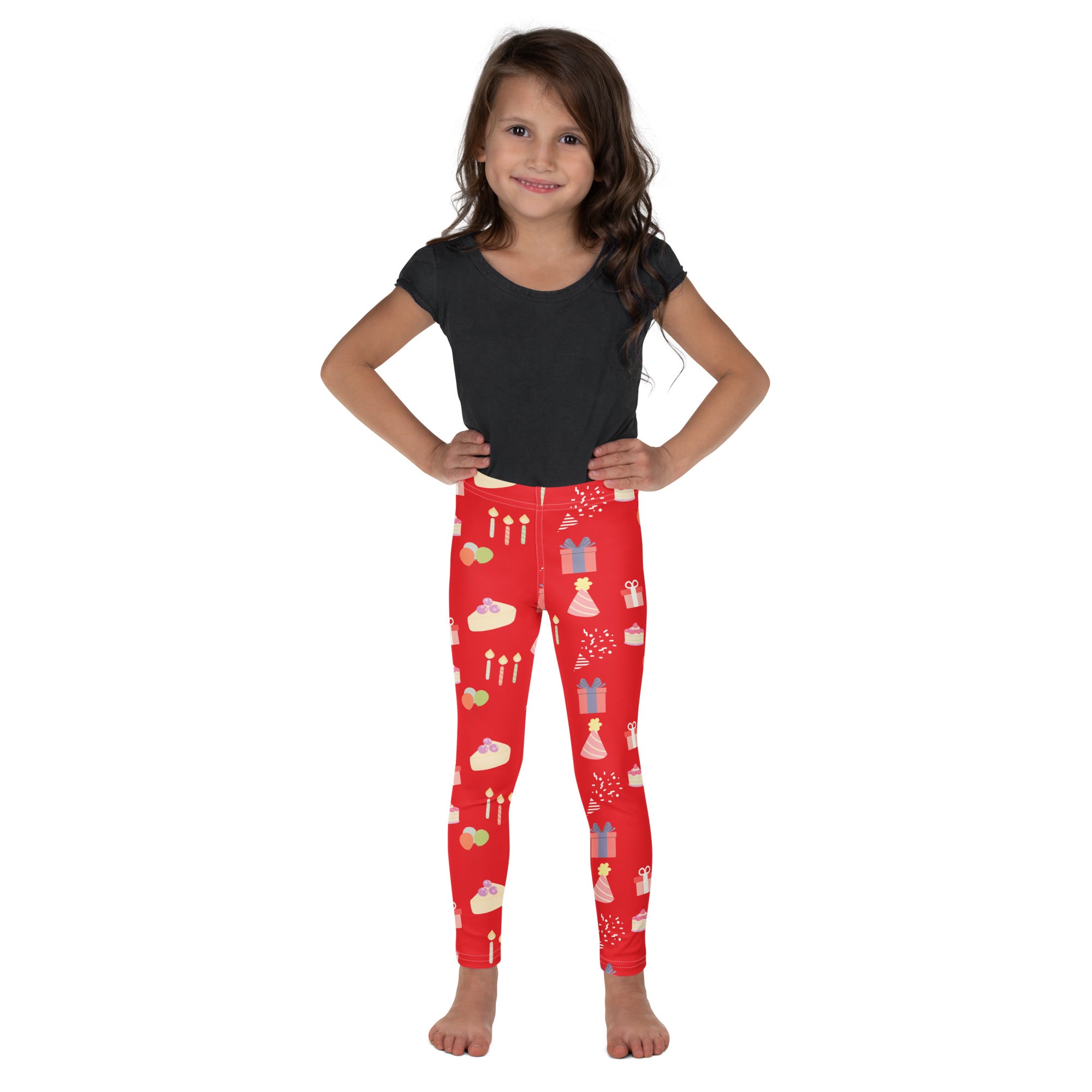 Kids red birthday pattern buttery soft leggings featuring festive cakes candles gifts and party hats design