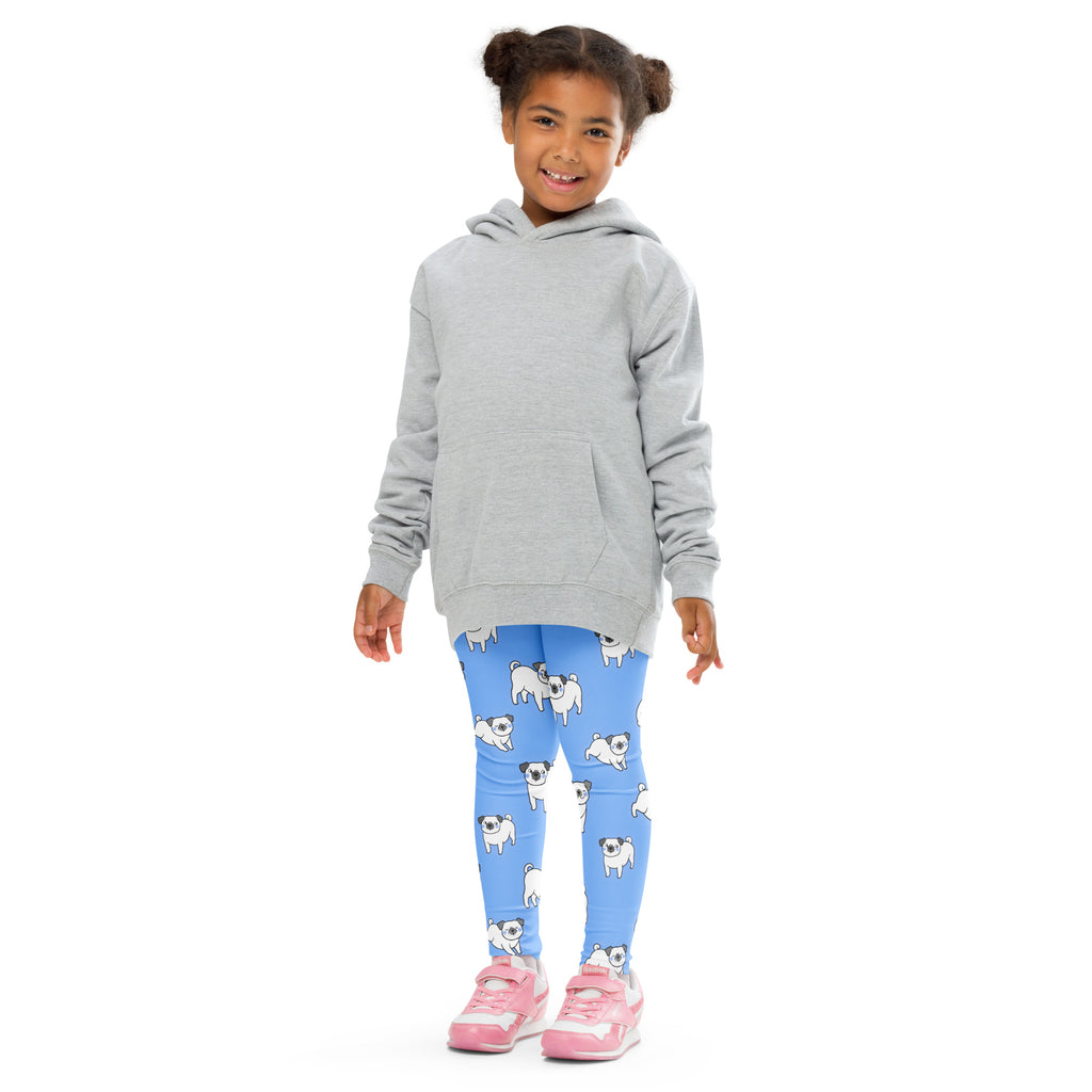 Kids blue pug buttery soft leggings with repeating white pug pattern worn with gray long sleeve hooded sweatshirt