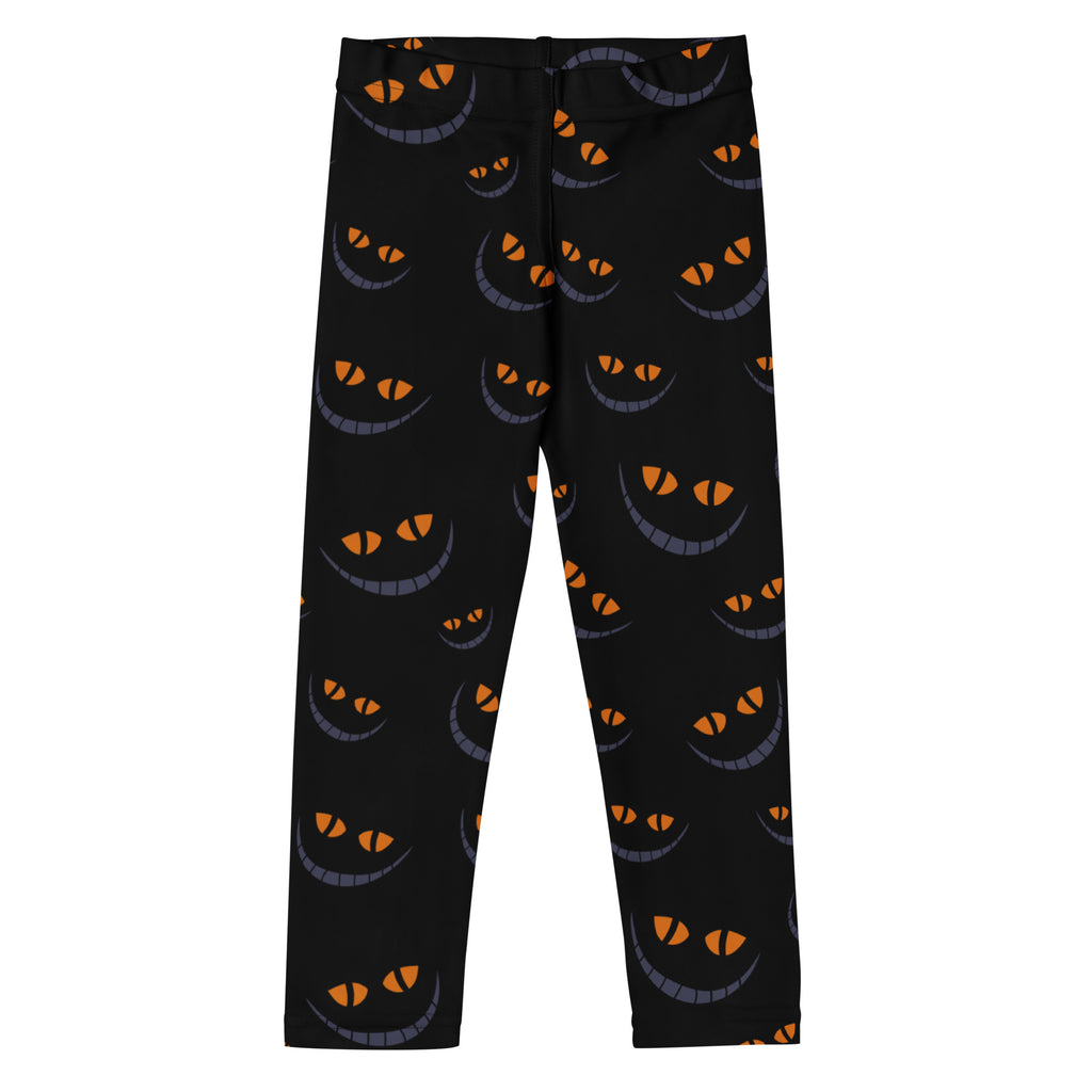 Black buttery soft kids leggings with playful orange and gray grinning cat faces for halloween