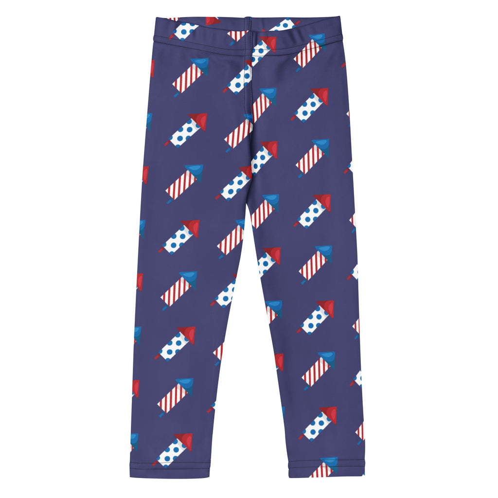 Purple kids firework rocket buttery soft leggings with a playful red white and blue fireworks pattern