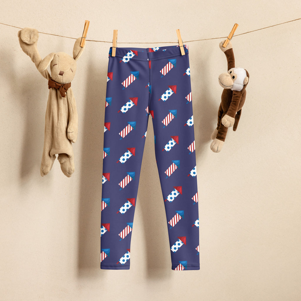 Navy blue kids firework rocket buttery soft leggings with red white and blue fireworks and soccer ball pattern