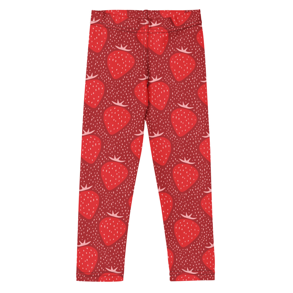 Girls strawberry print buttery soft leggings in red with a playful illustrated strawberry pattern on solid background