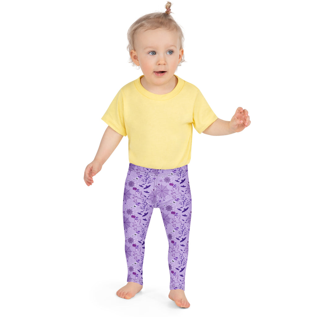 Kids purple halloween buttery soft leggings with bats spiders and spooky tree pattern for festive wear