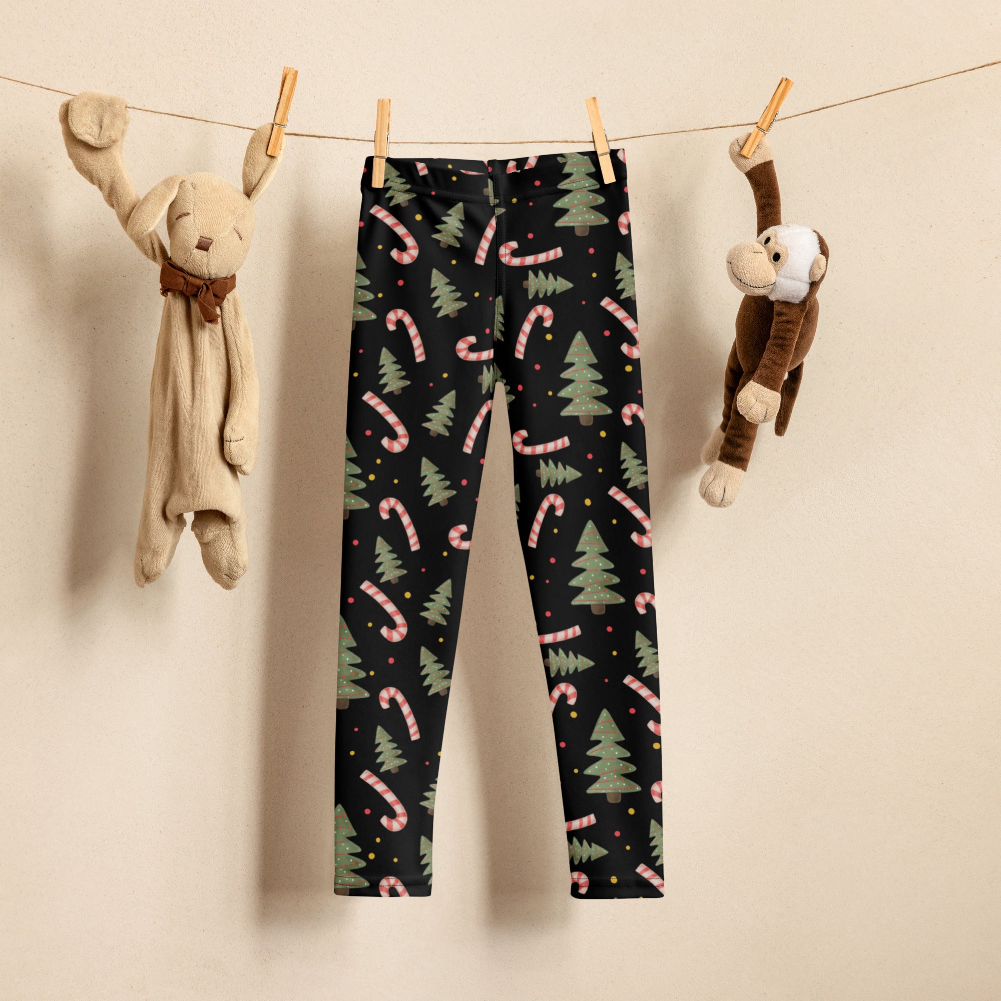 Kids christmas candy canes and trees buttery soft black leggings with green pine tree and pink candy cane festive pattern