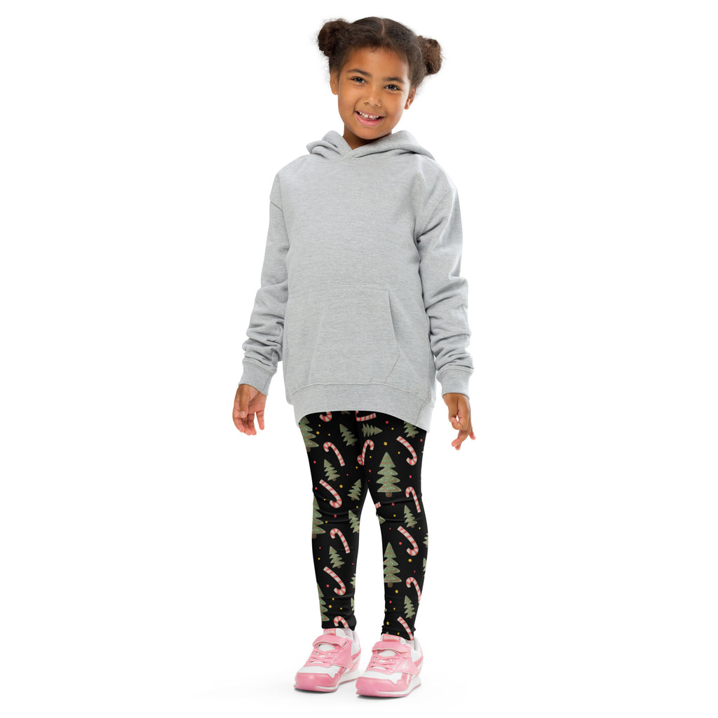 Gray hooded sweatshirt with long sleeves and front pocket paired with kids christmas candy canes and trees buttery soft leggings