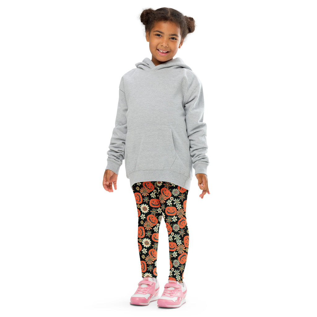 Gray hooded sweatshirt with front pocket and long sleeves paired with kids vintage halloween pumpkin floral leggings