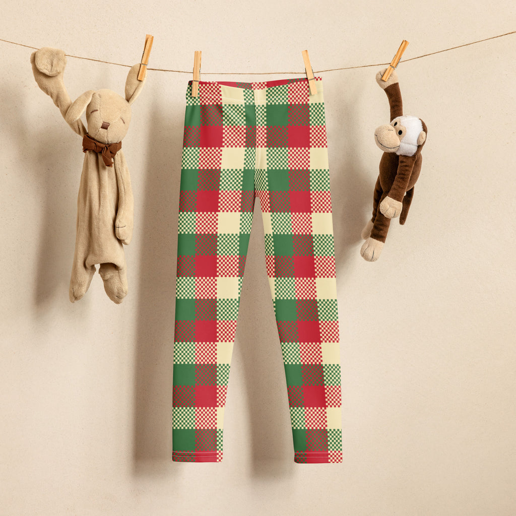 Kids christmas plaid buttery soft leggings in red green and cream with a subtle checkered pattern