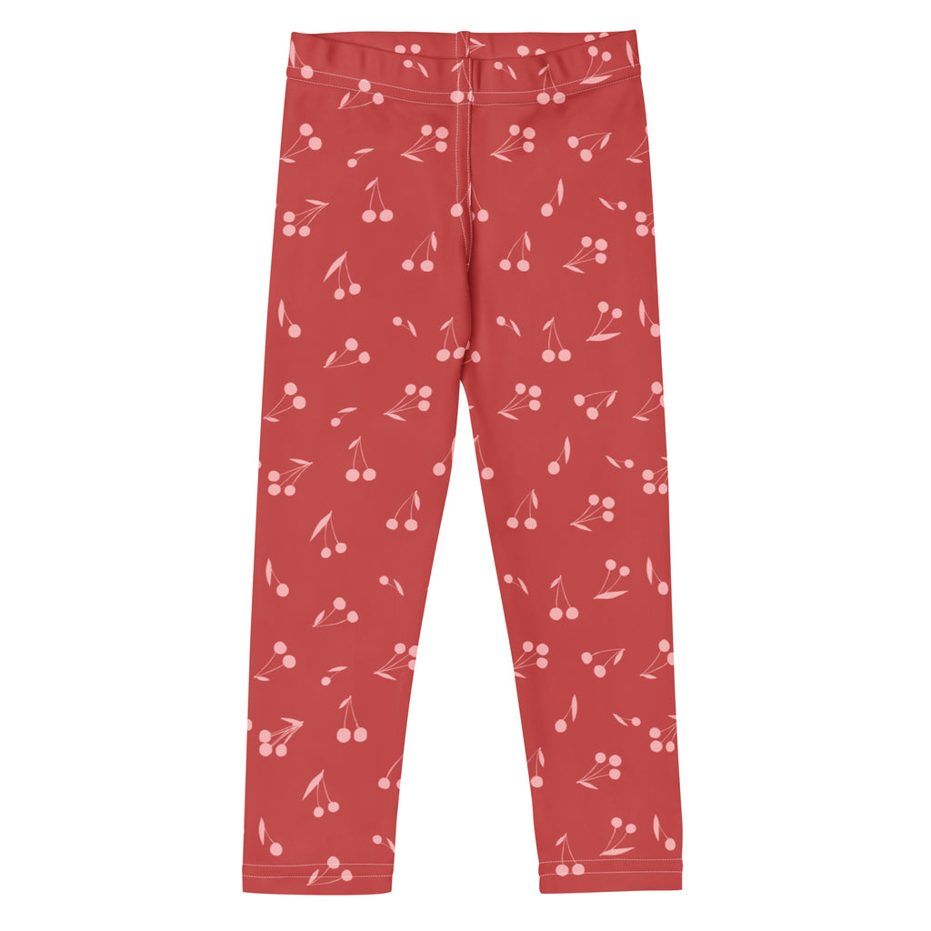 Girls pink cherry pattern buttery soft leggings in red with soft stretchy fabric and delicate white cherry illustrations