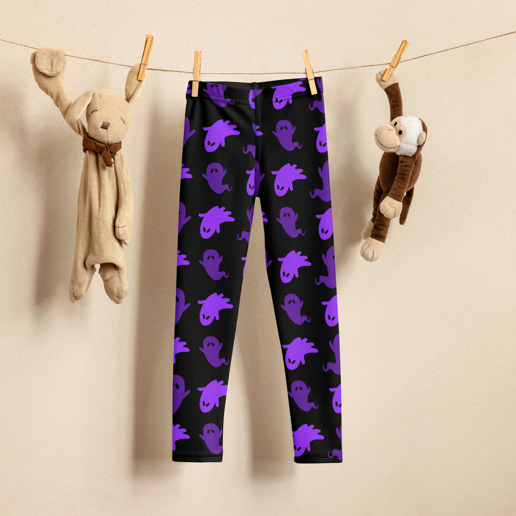 Girls purple ghosts halloween buttery soft black leggings with a repeating pattern of purple cartoon ghosts on a clothesline