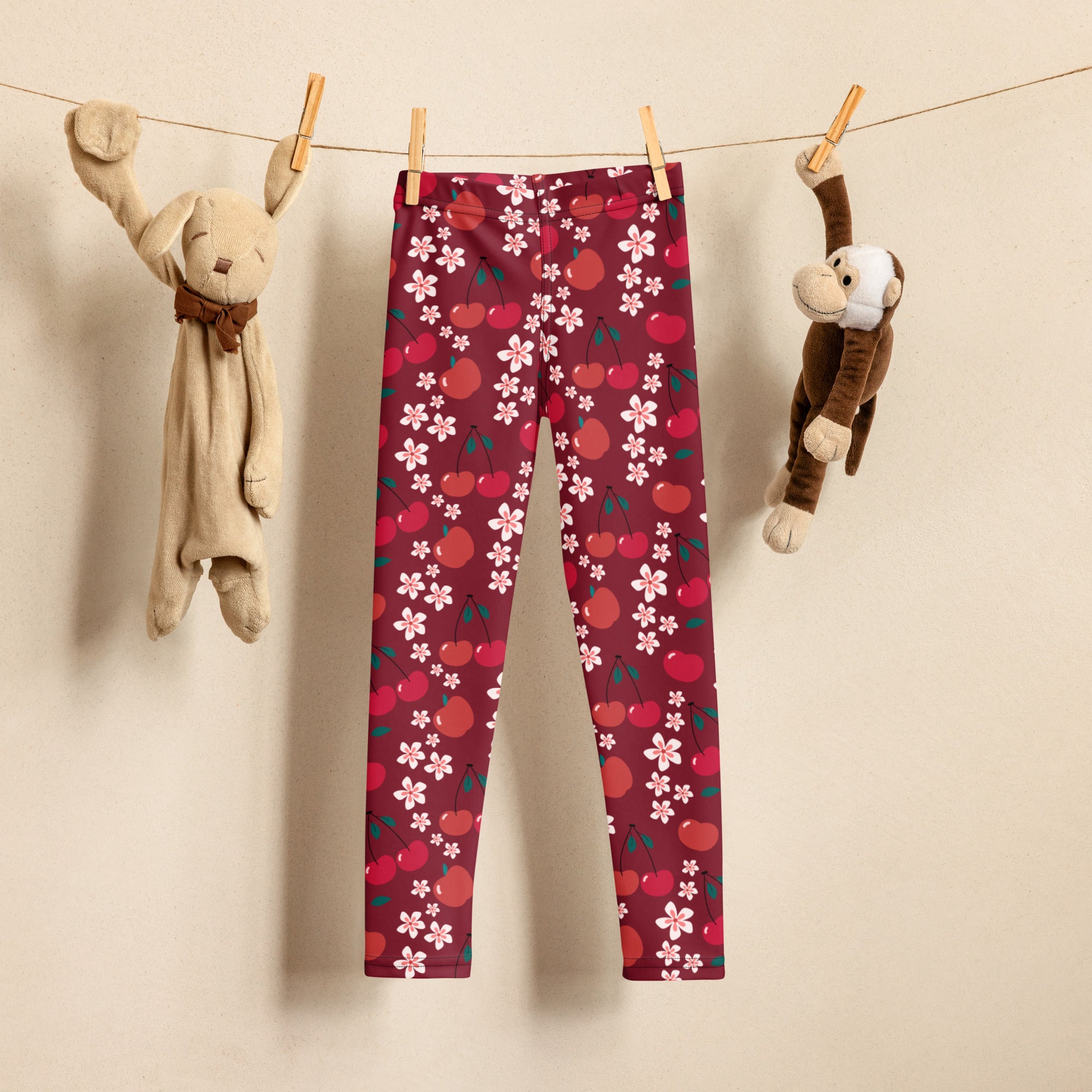 Girls cherry blossom print buttery soft maroon leggings with red cherries and white blossoms pattern