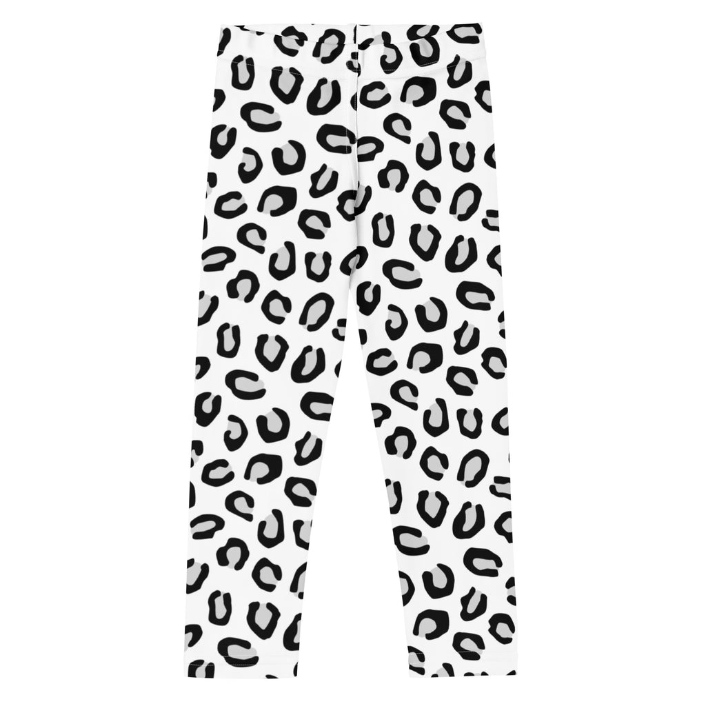 Girls black and white leopard print buttery soft leggings with bold black leopard print pattern on white fabric