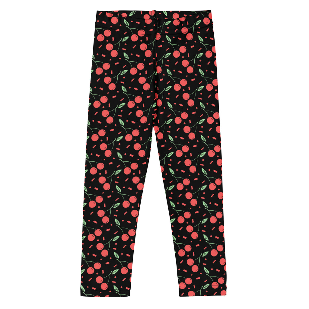 Girls black cherry confetti buttery soft leggings with red cherries green leaves and pink confetti dots pattern