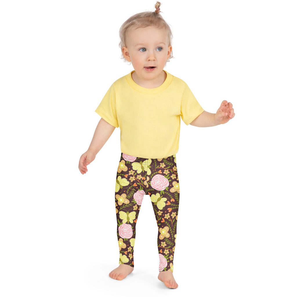 Girls brown floral buttery soft leggings with yellow pink roses butterflies and small flowers on dark brown background