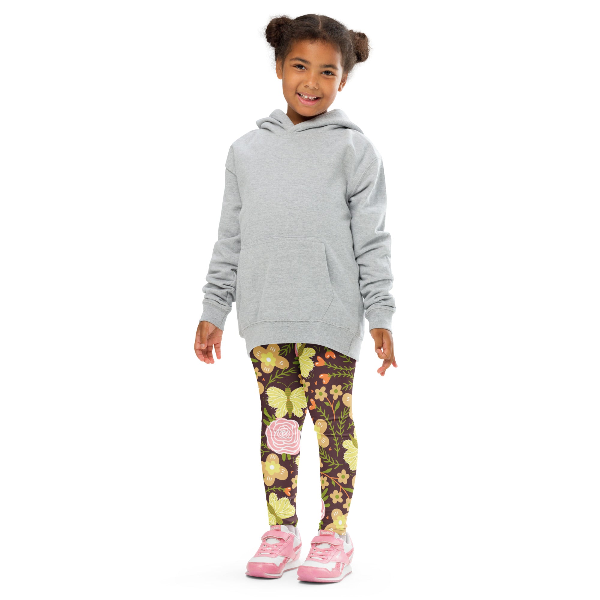 Gray hooded sweatshirt with front pocket and long sleeves paired with girls brown floral buttery soft leggings