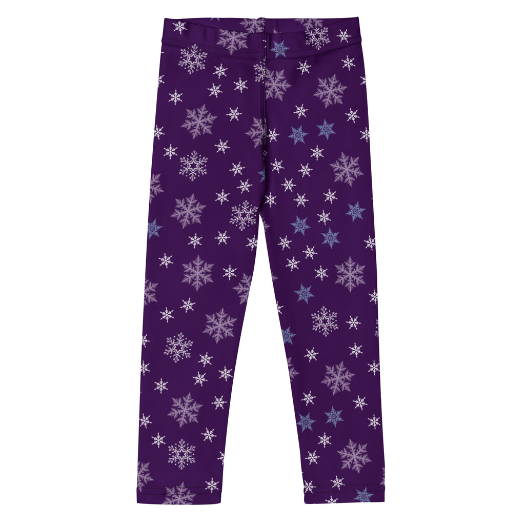 Purple leggings with star and snowflake pattern on a white background