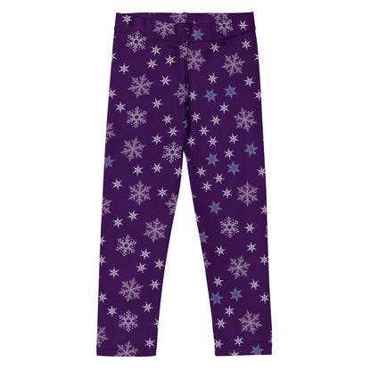 Purple leggings with star and snowflake pattern on a white background