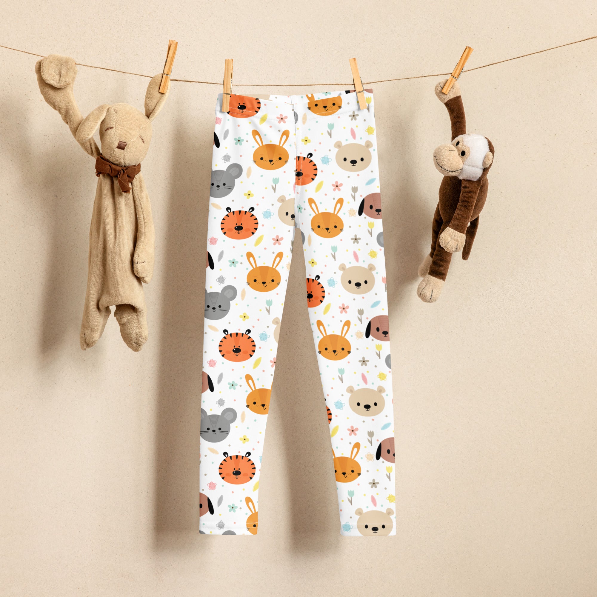 White kids animal faces buttery soft leggings with playful cartoon rabbits tigers and bears in soft orange gray and beige tones