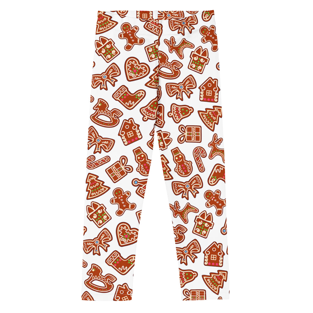 White kids leggings with buttery soft fabric and festive gingerbread cookie pattern in brown red and green colors