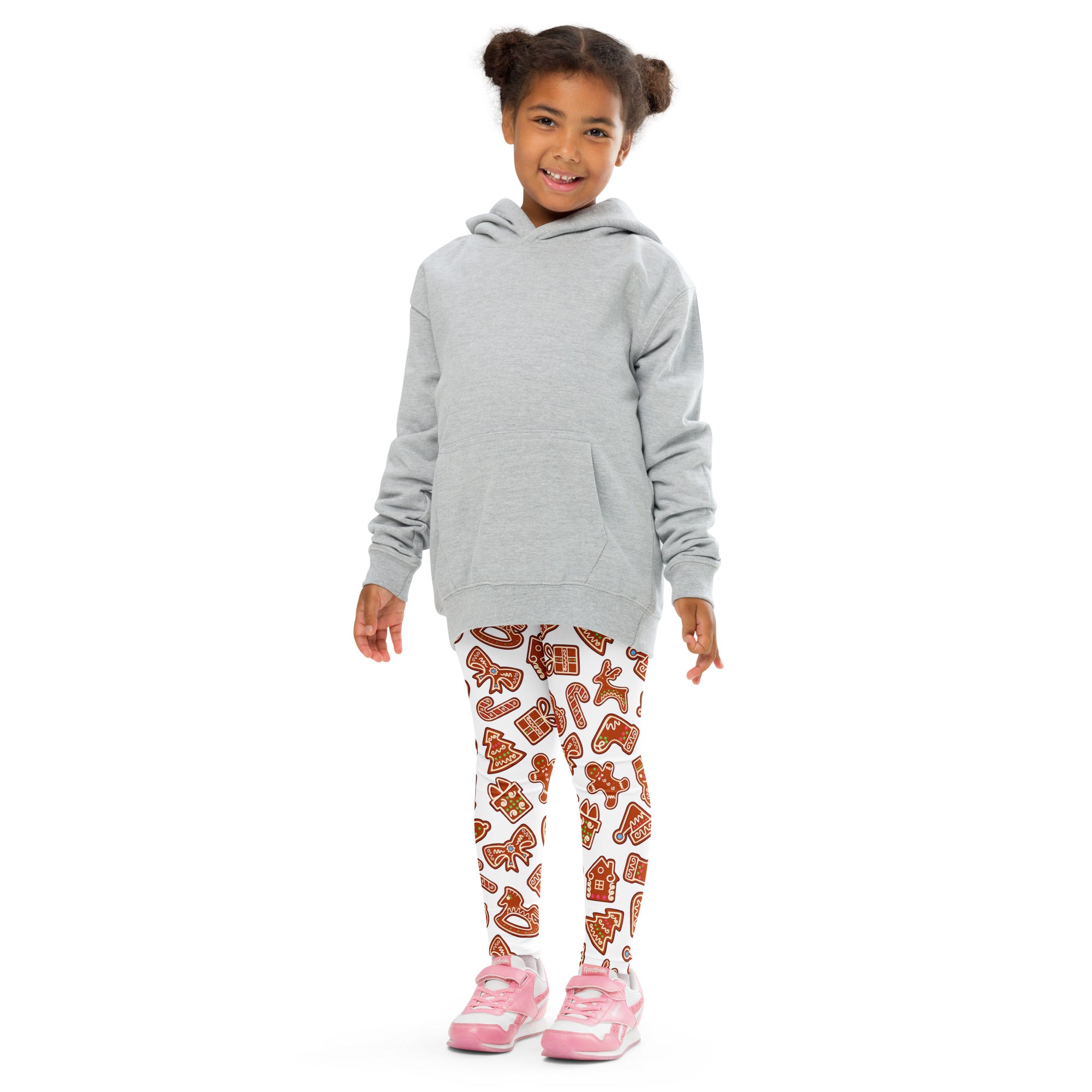 Gray hooded sweatshirt with long sleeves and front pocket paired with kids gingerbread cookie christmas buttery soft leggings
