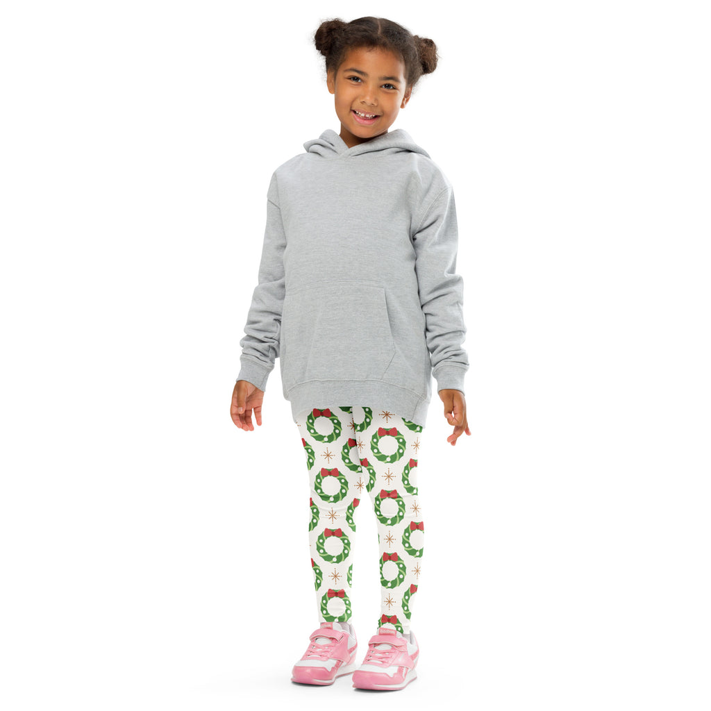 Gray hooded sweatshirt with festive green wreath and red bow pattern on the lower half for kids holiday wear