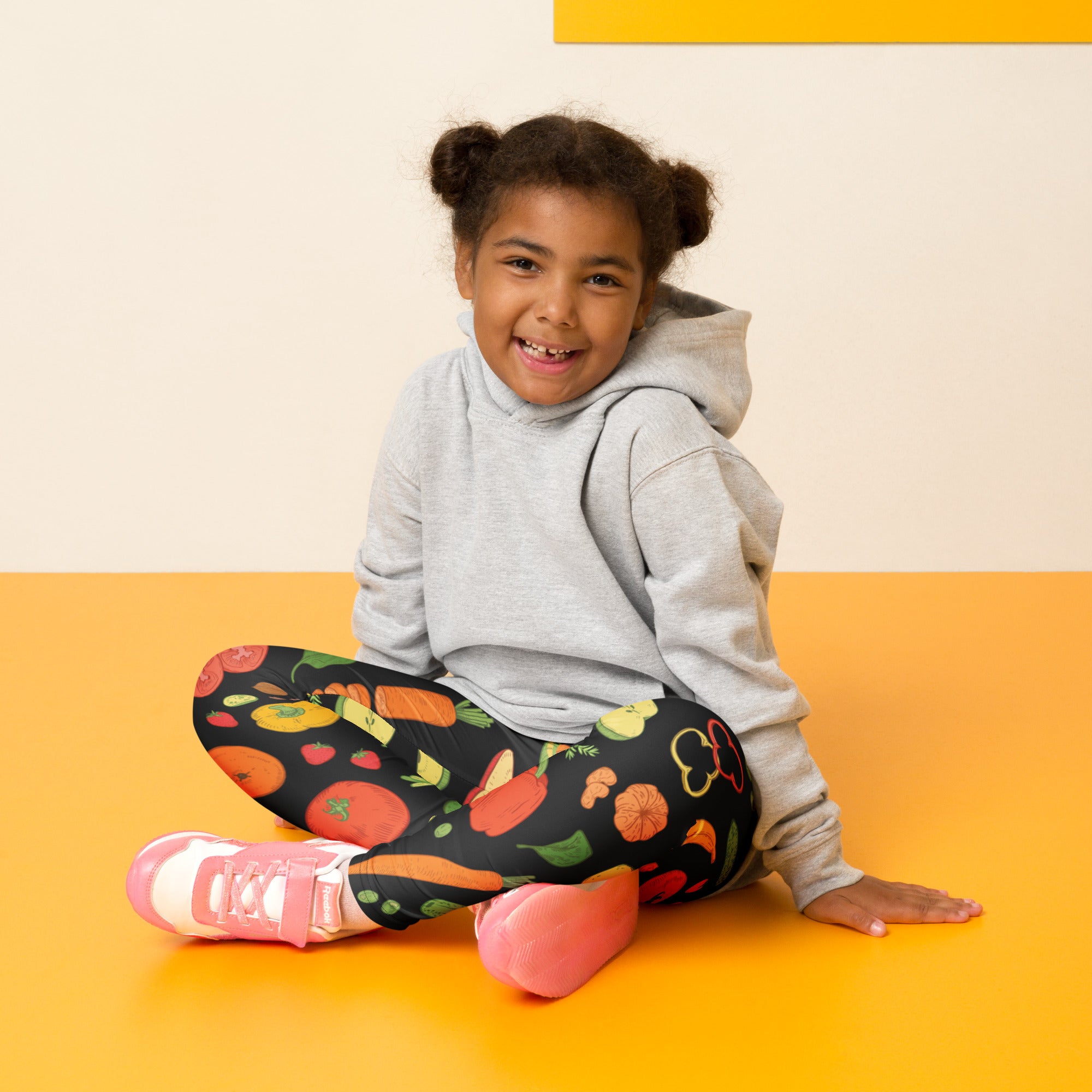 Kids veggie print buttery soft black leggings with vibrant colorful fruit and vegetable pattern