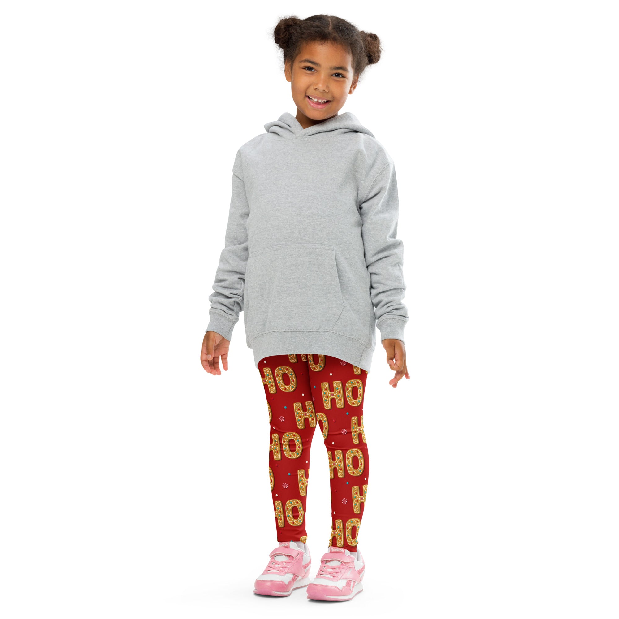 Gray hooded sweatshirt with front pocket and long sleeves paired with girls gingerbread ho ho ho buttery soft leggings