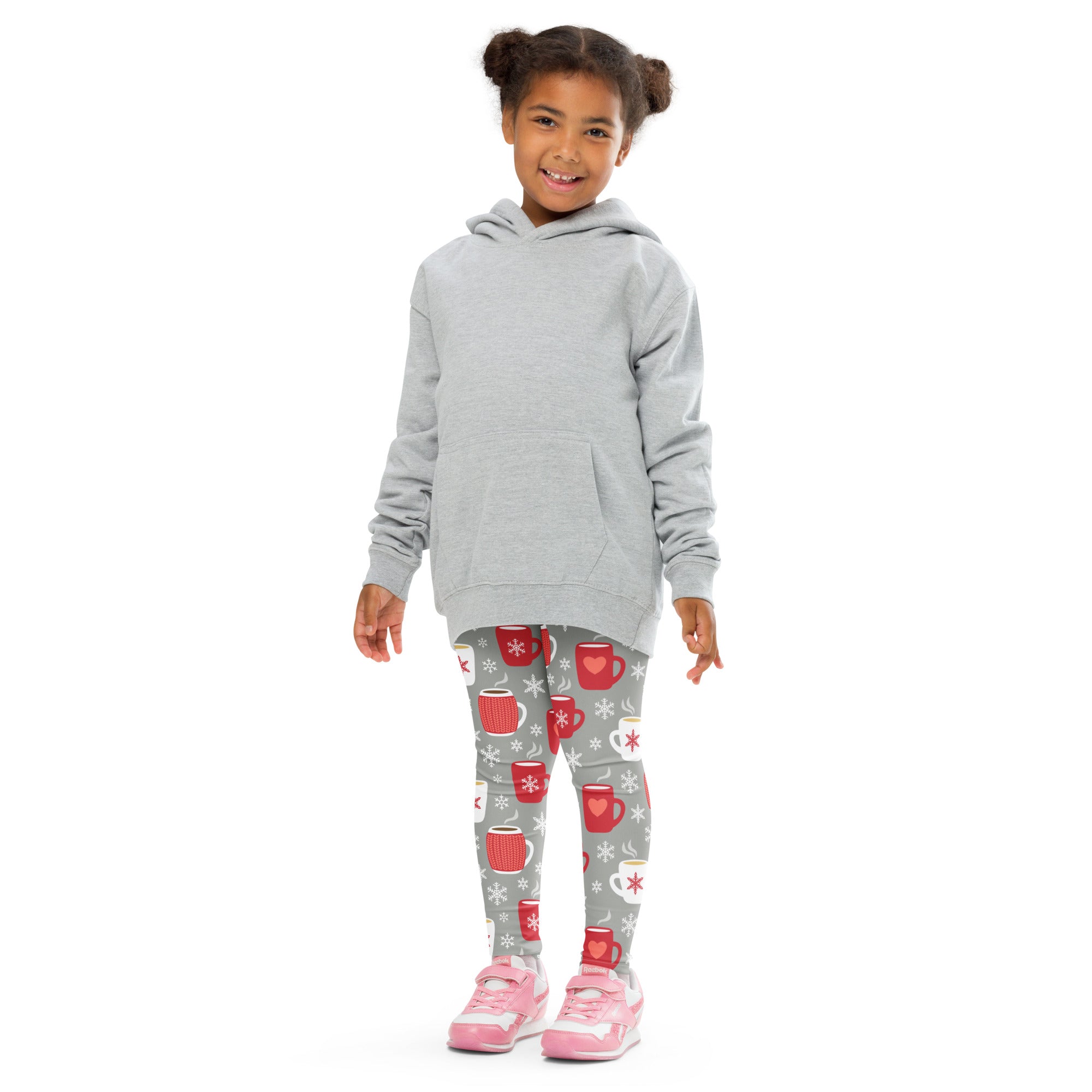 Kids cozy hot cocoa themed buttery soft gray leggings with red and white coffee mug print paired with pink sneakers