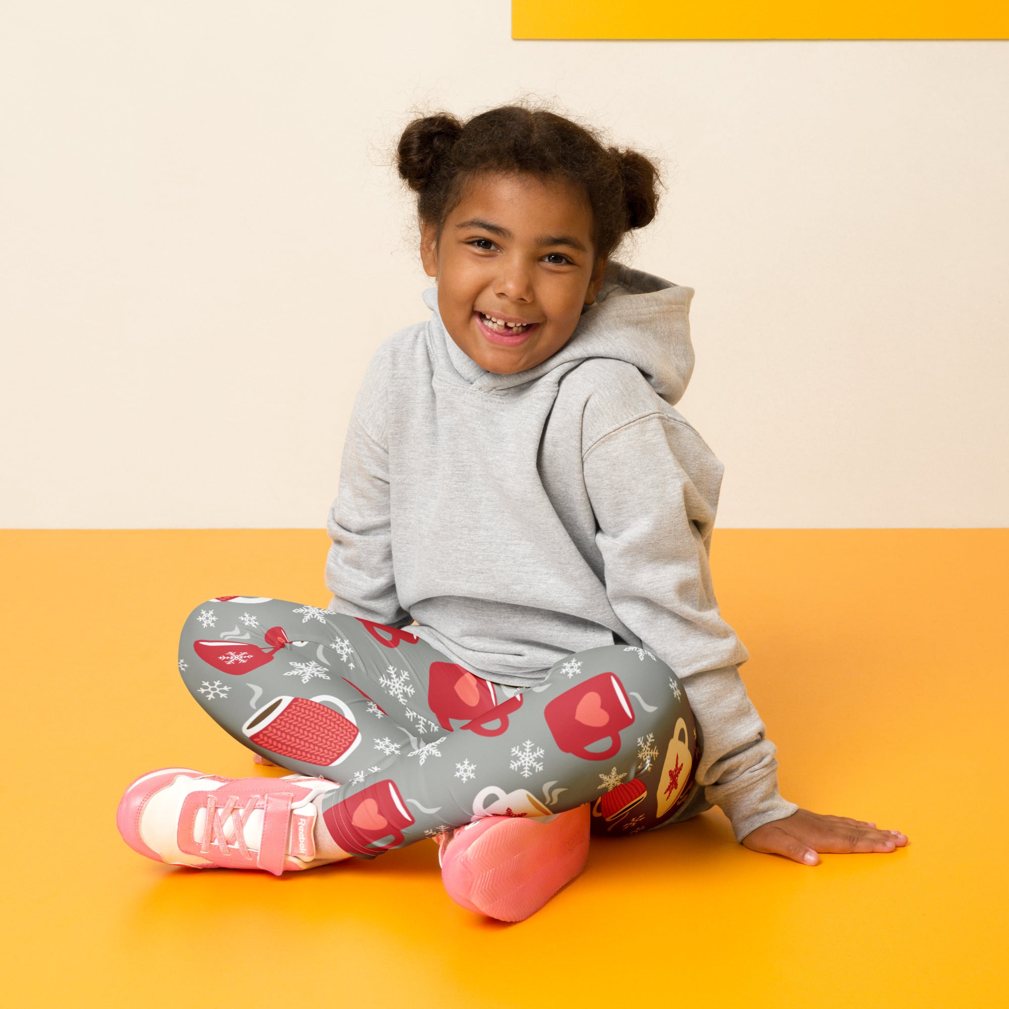 Kids cozy hot cocoa themed buttery soft gray leggings with red coffee mugs white snowflakes and steam wisps pattern