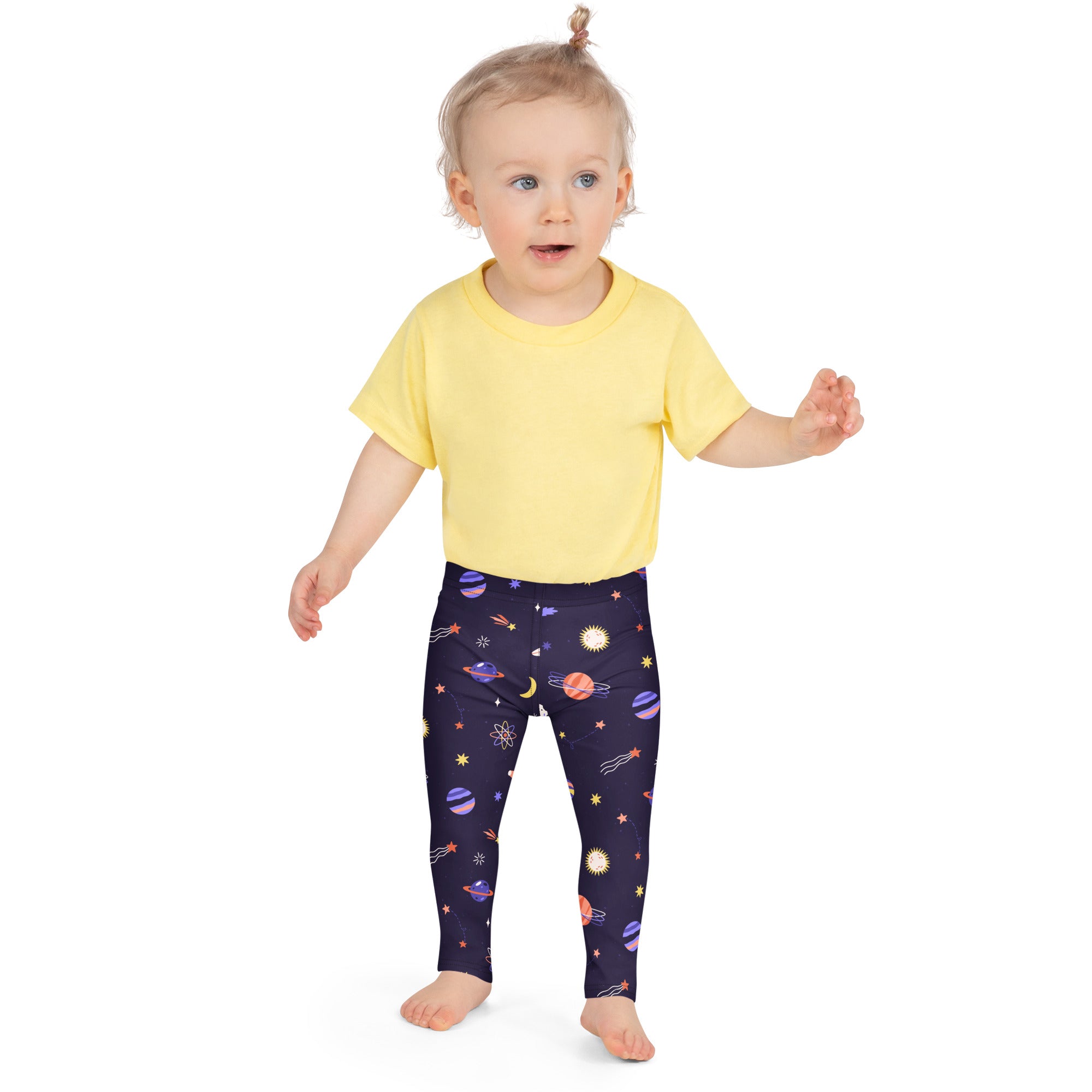 A child wearing girls purple outer space buttery soft leggings with colorful space prints and a yellow short-sleeved shirt