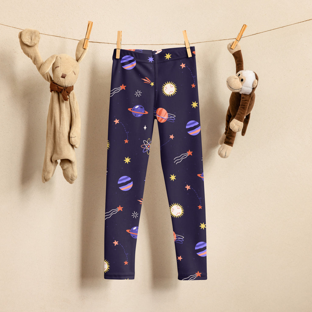 Girls purple outer space buttery soft leggings in dark blue with colorful planets stars and suns playful pattern