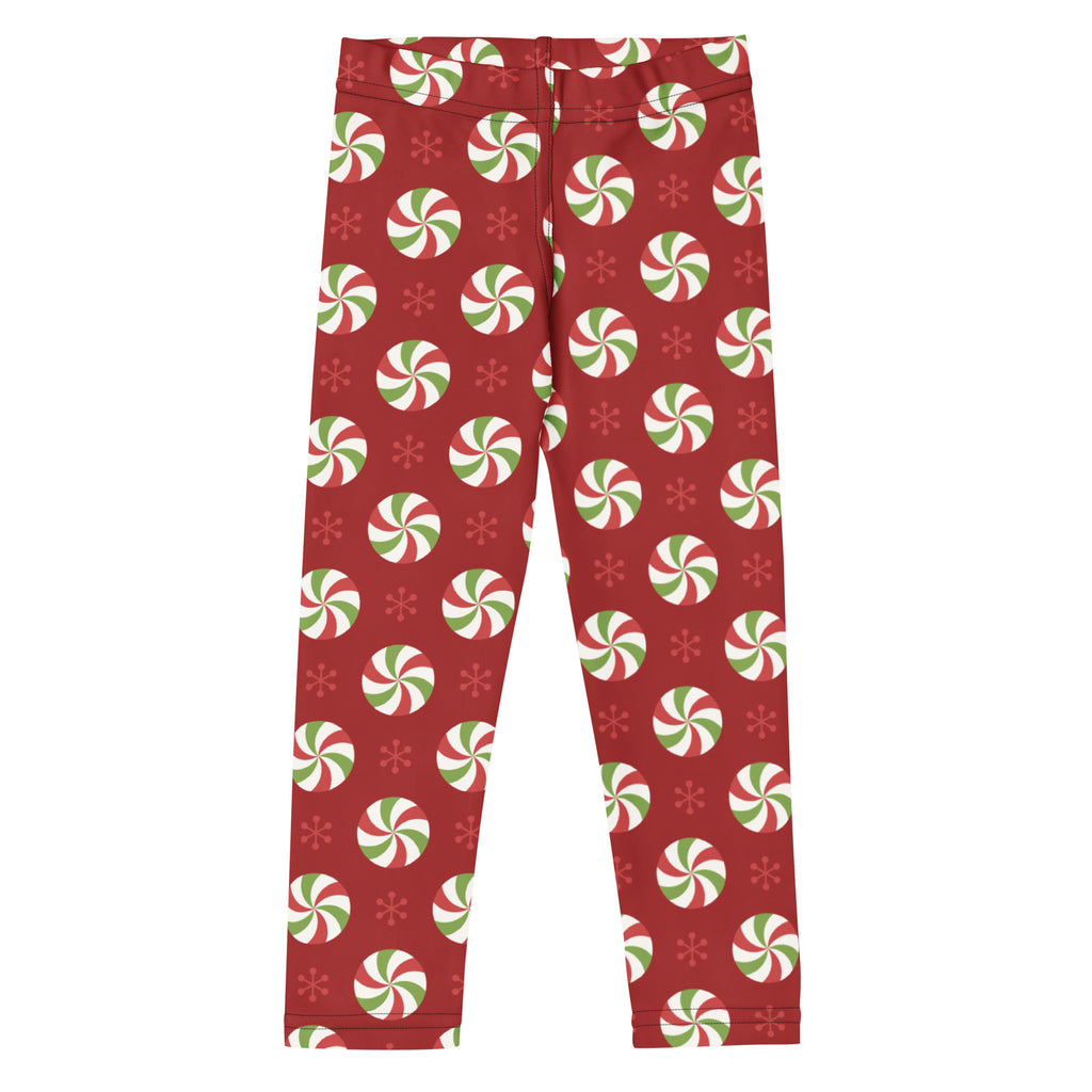 Kids christmas peppermint buttery soft red leggings with green and white peppermint candies and snowflake pattern
