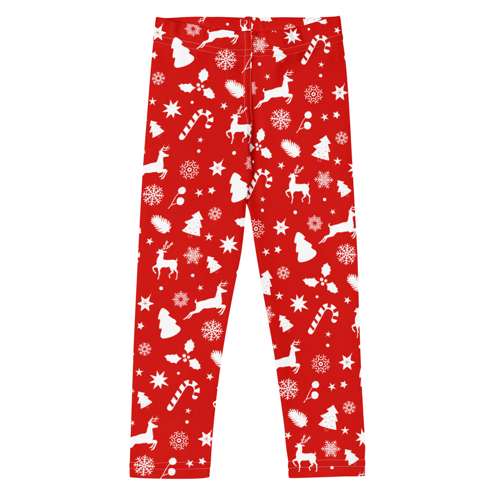 Kids red christmas pattern buttery soft leggings featuring white reindeer snowflakes candy canes and trees design