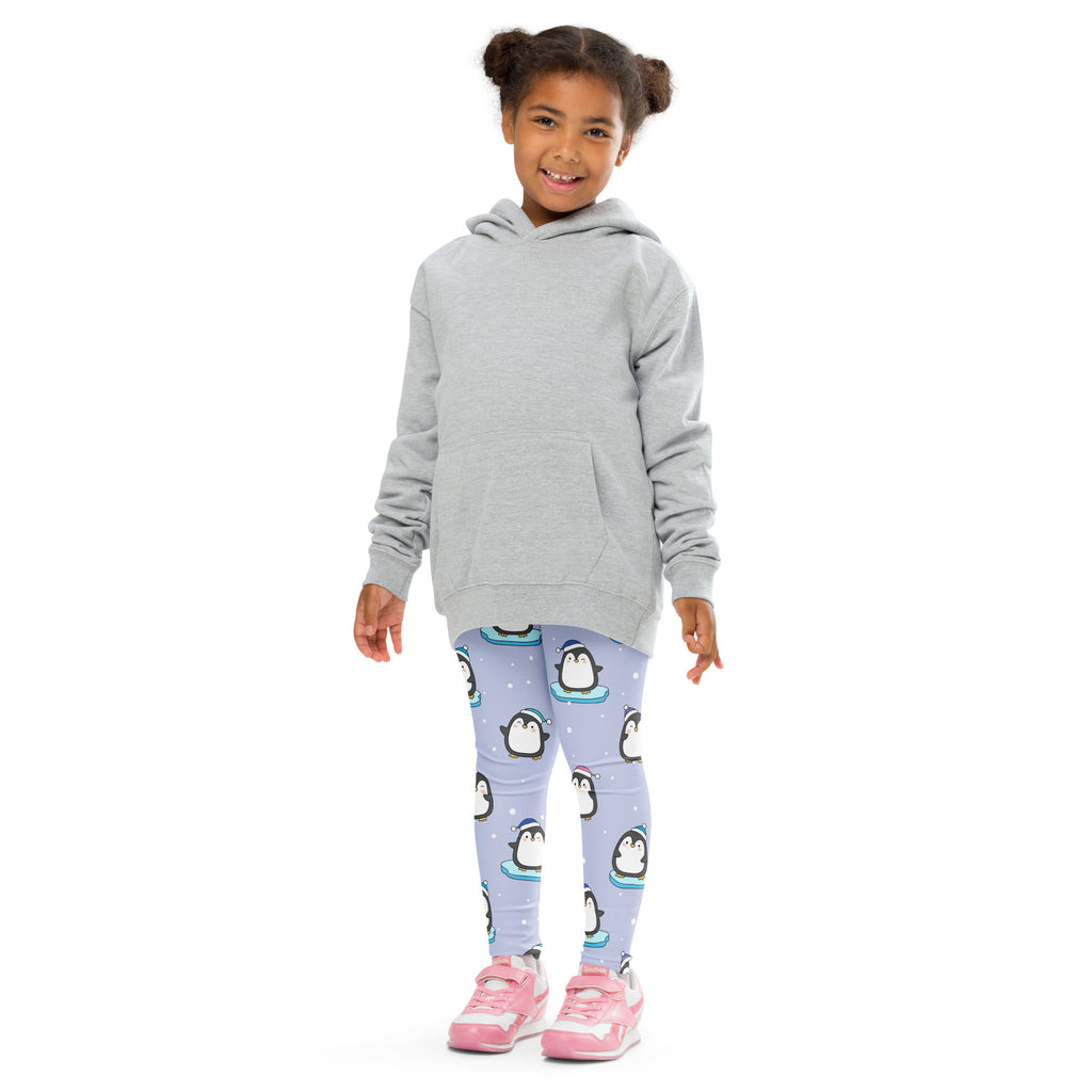 Girls winter penguin christmas buttery soft light purple leggings with cartoon penguin pattern worn with gray hooded sweatshirt