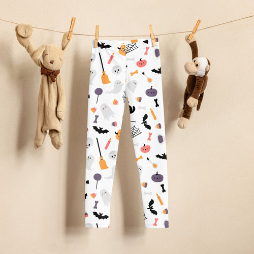 Girls ghost and pumpkin print buttery soft white leggings with playful ghosts bats pumpkins and candy in halloween colors