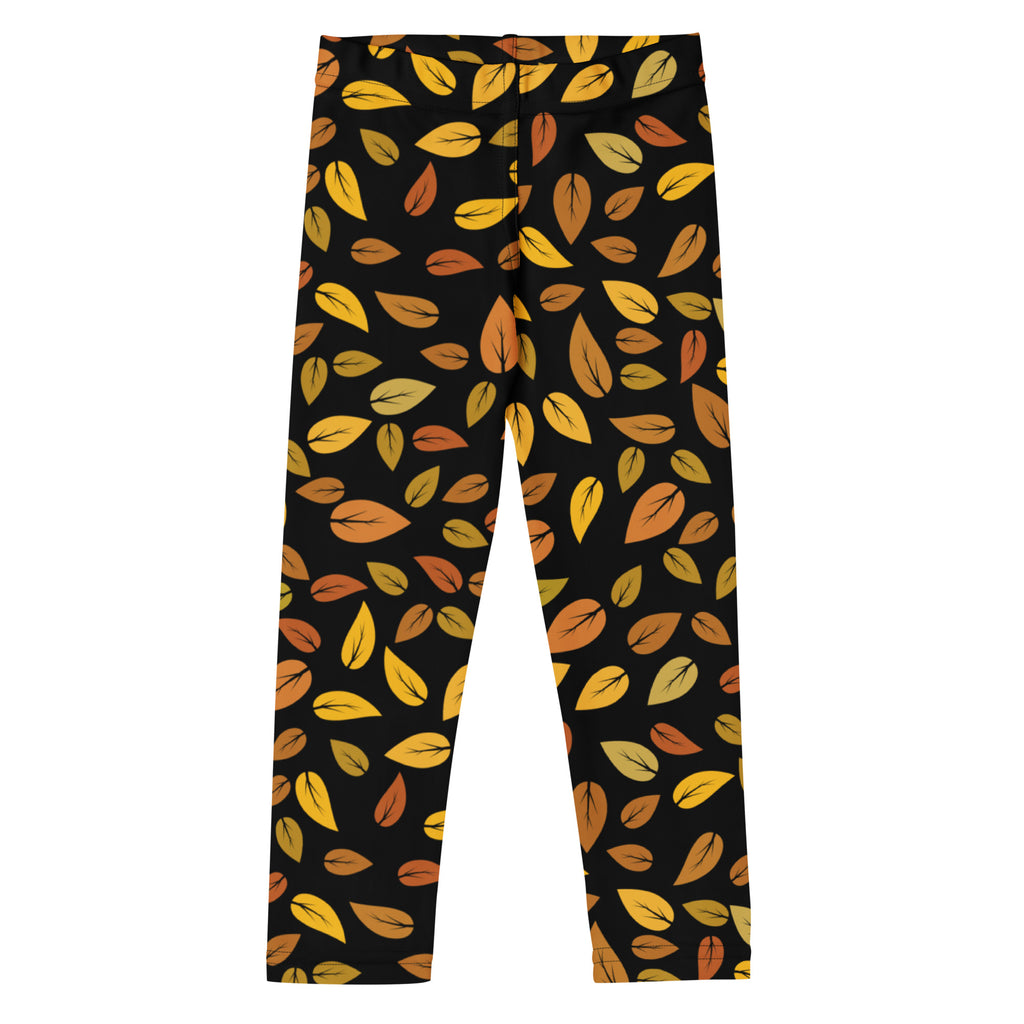 Kids autumn leaf buttery soft leggings in black with vibrant yellow and orange autumn leaves pattern