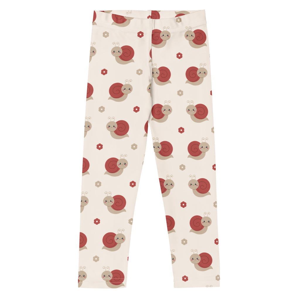 Girls buttery soft cream-colored leggings with playful red and beige snail pattern and tiny scattered flowers