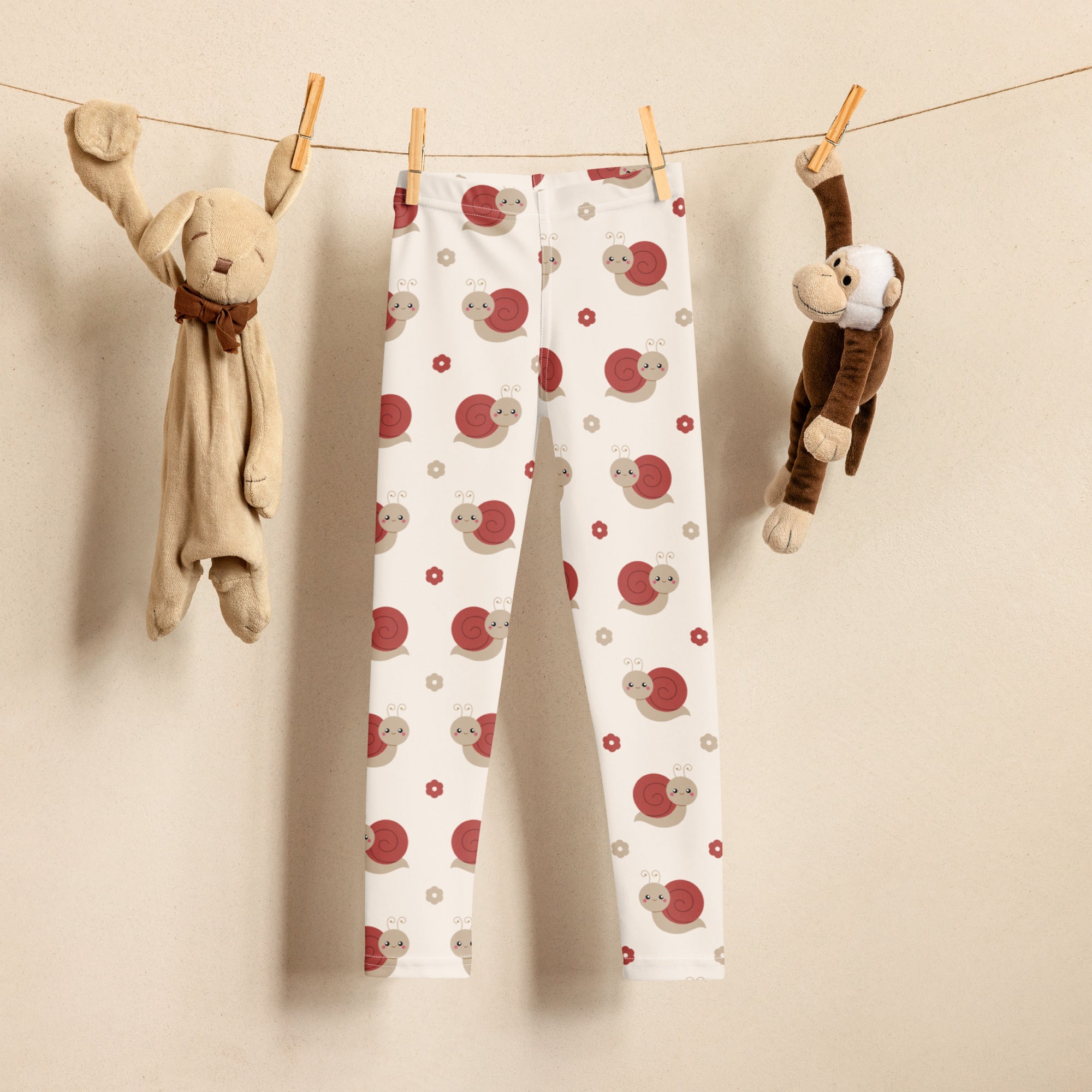 Girls red snail buttery soft white leggings with a playful red snail and small flower pattern