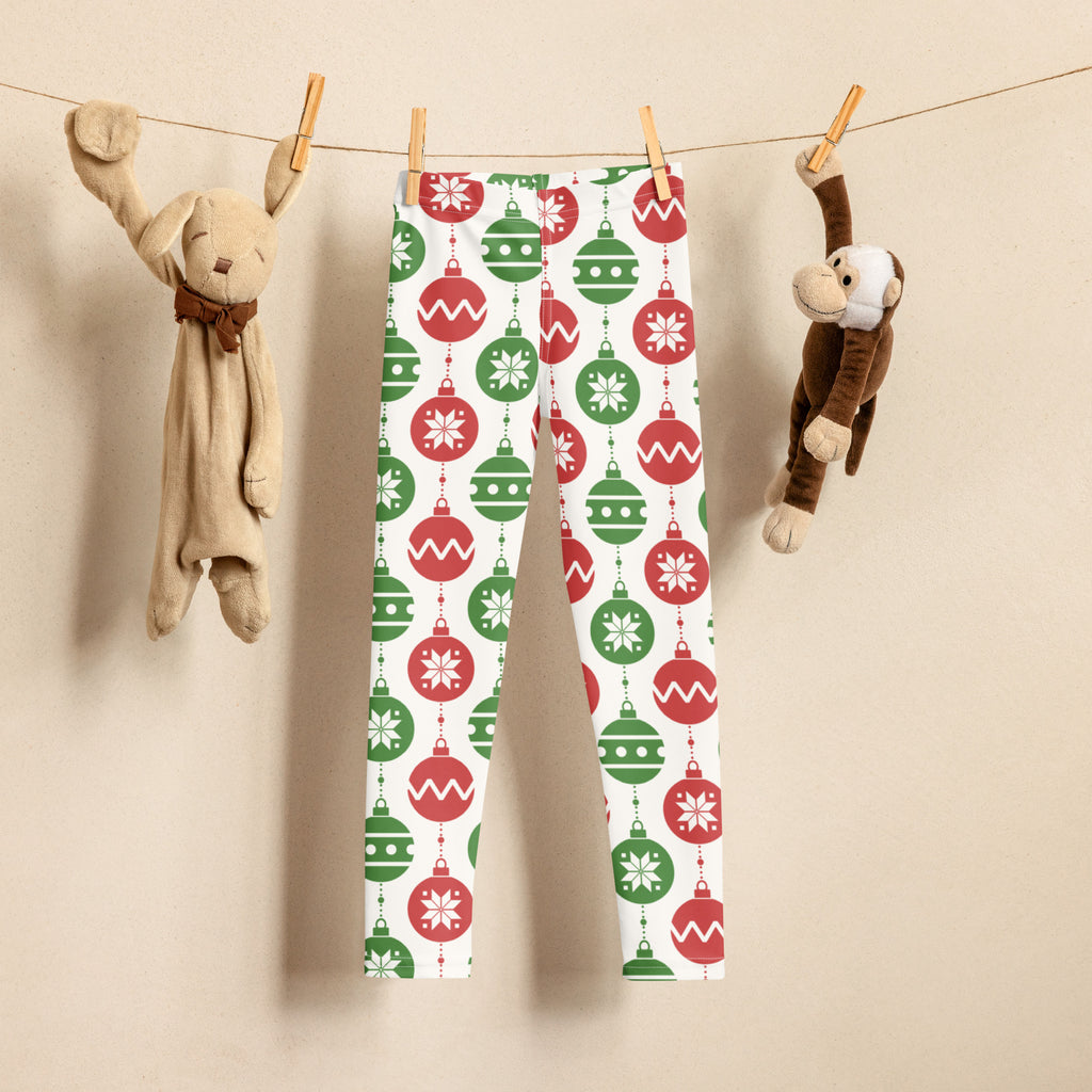 White kids leggings with red and green christmas ornaments and snowflakes in buttery soft fabric