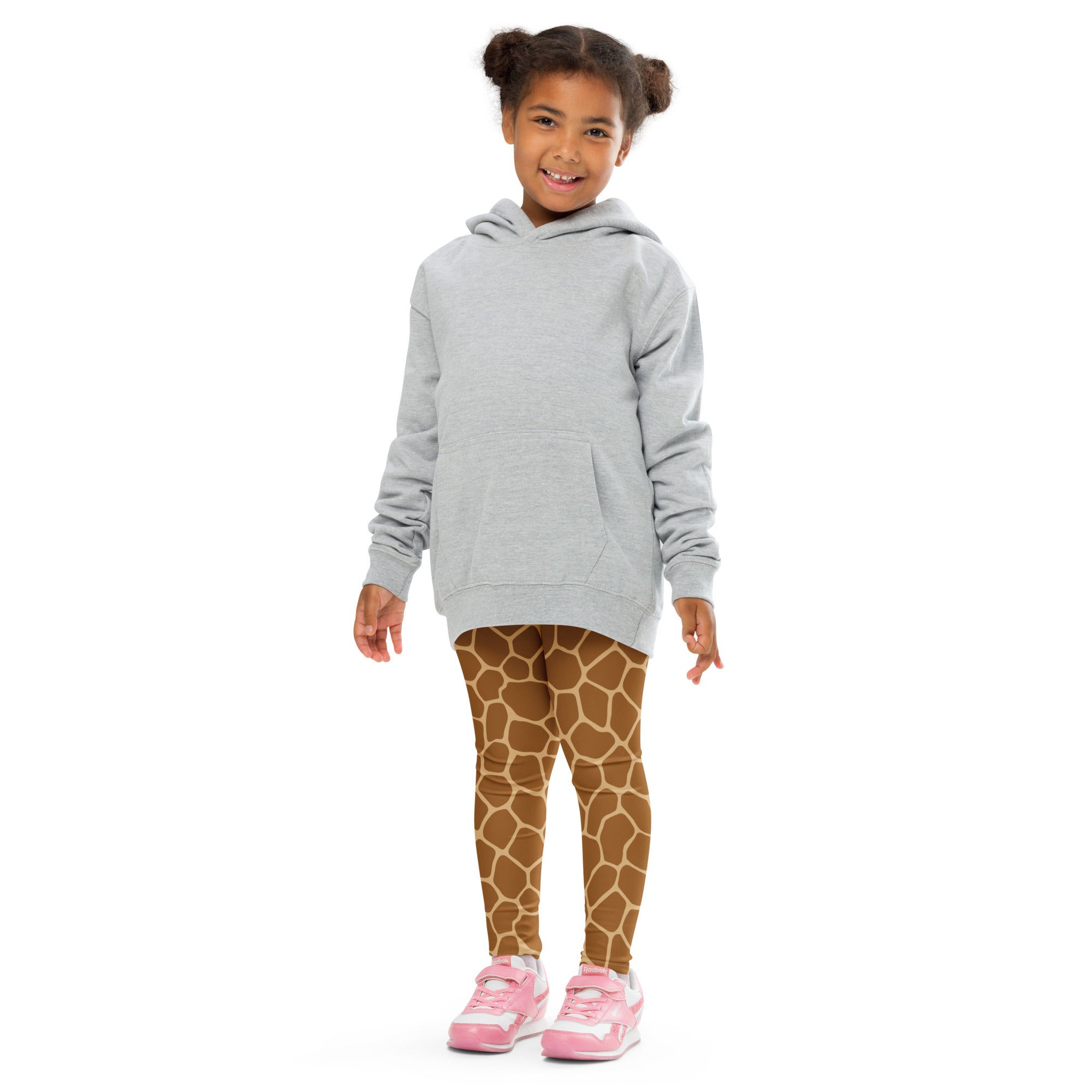 A child wearing light gray hooded sweatshirt and brown giraffe print buttery soft kids leggings