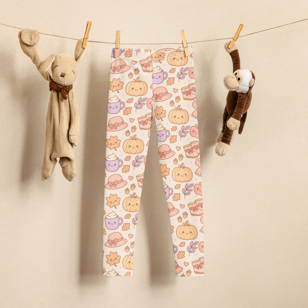 Kids cute fall themed buttery soft white leggings with orange pumpkins purple mugs pink hats and autumn leaves pattern