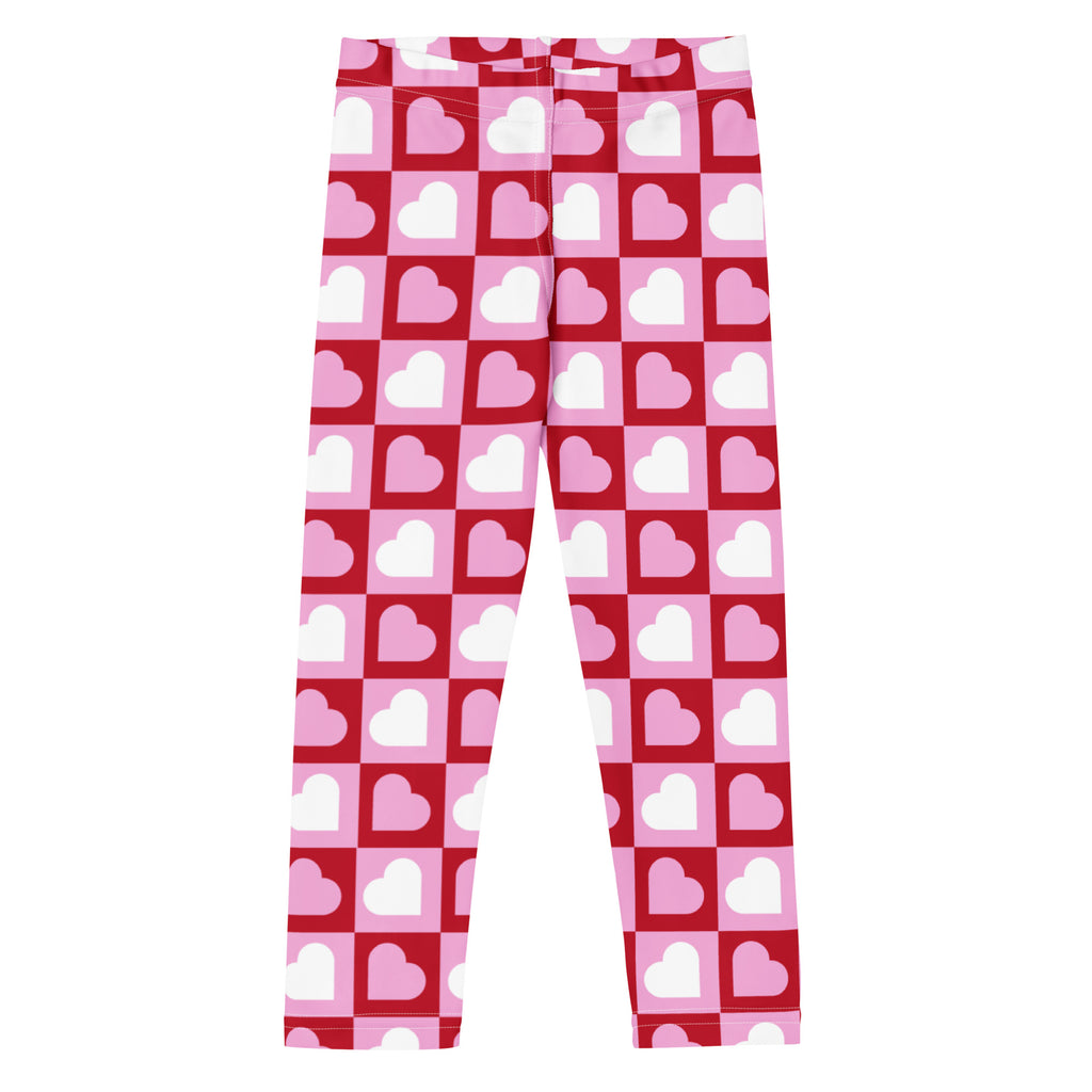 Girls pink checkered heart buttery soft leggings with red and pink heart patterns and a checkered design