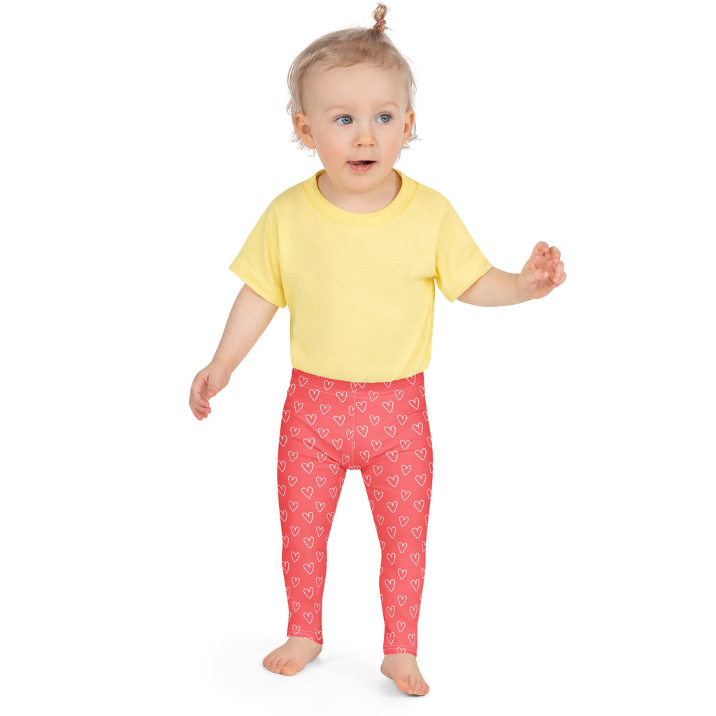 Girls pink heart outline buttery soft leggings in pink with white heart patterns for comfortable wear