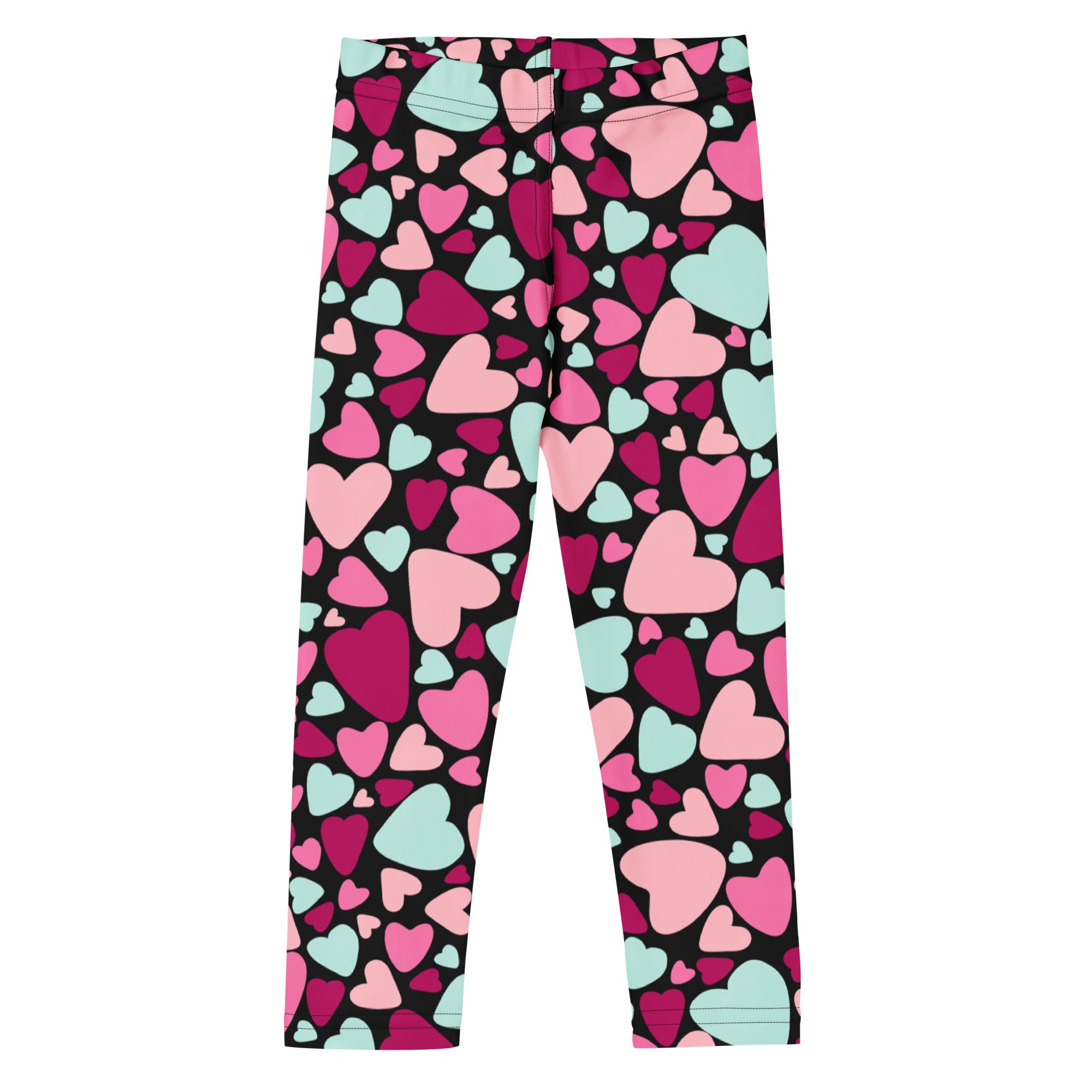 Girls multicolor heart buttery soft leggings featuring black fabric with vibrant pink and mint green heart patterns
