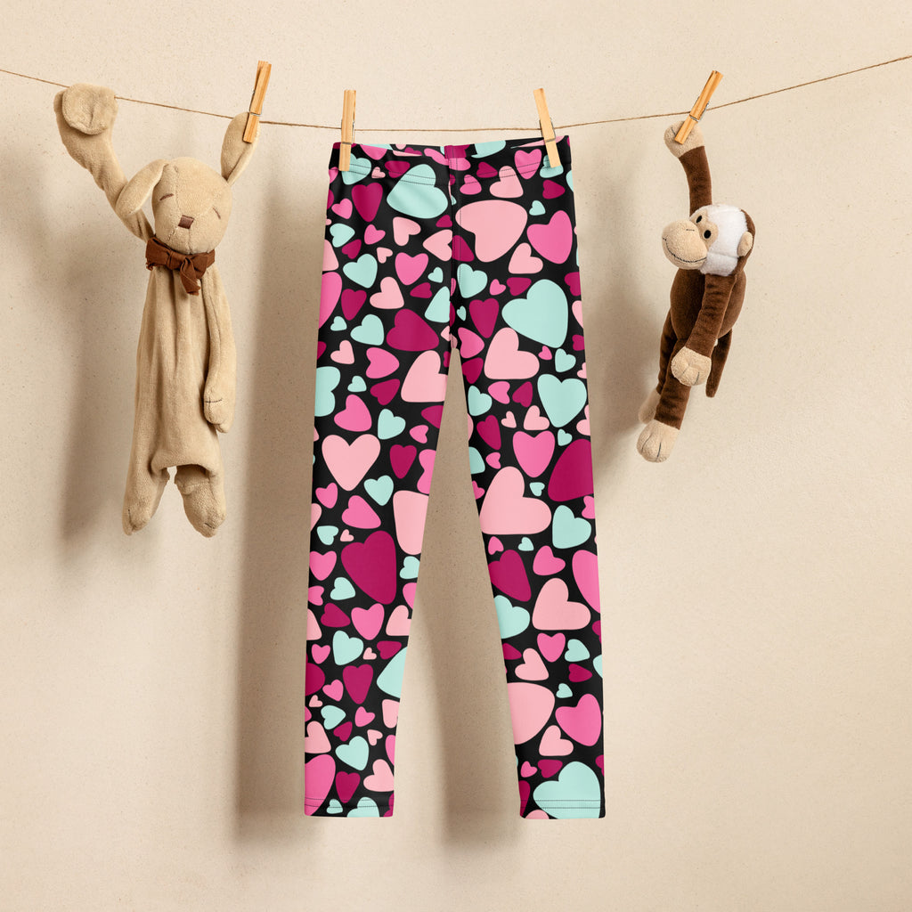 Girls multicolor heart buttery soft black leggings with vibrant pink magenta and mint green heart patterns