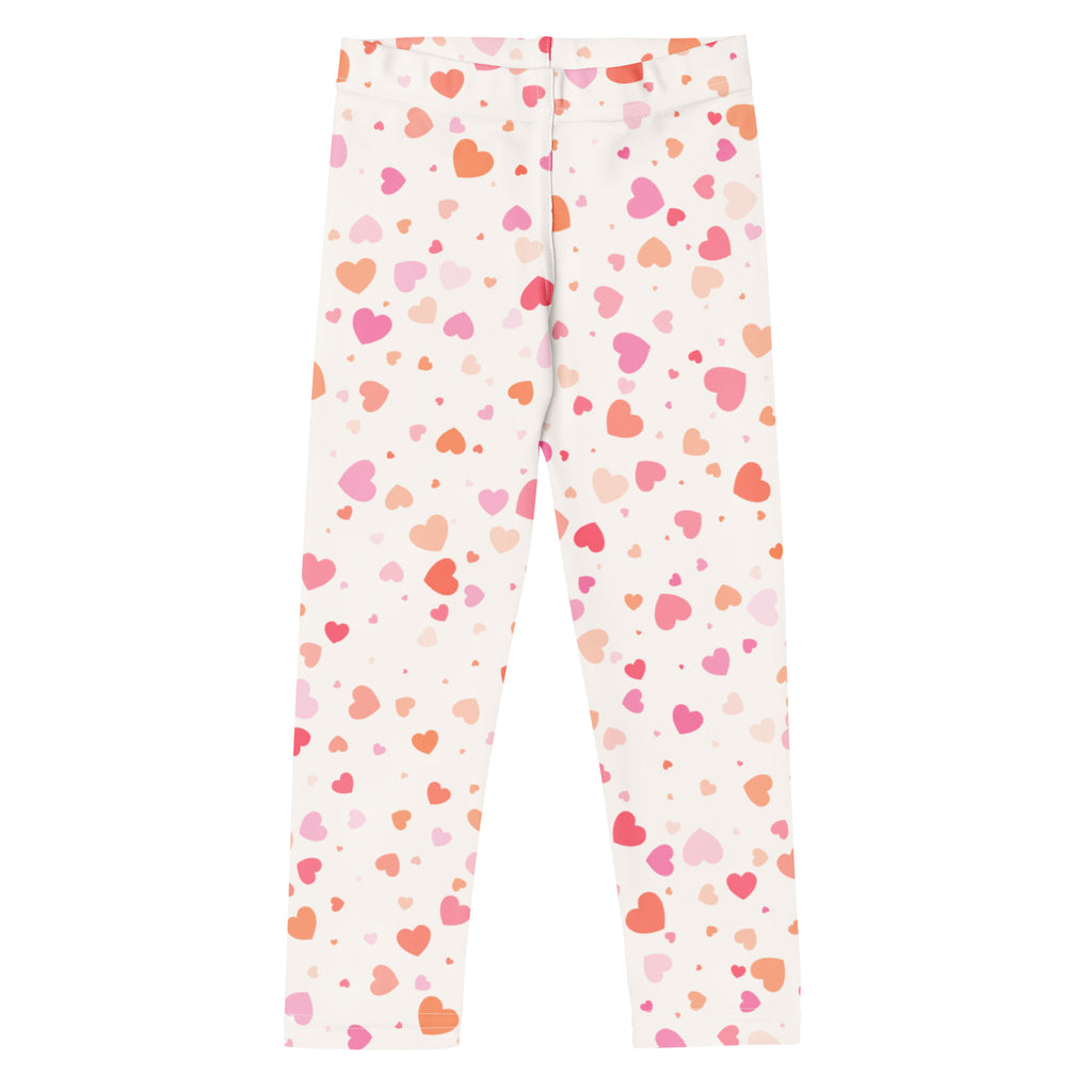 Girls pastel heart buttery soft white leggings with playful pink and orange heart pattern for comfortable wear