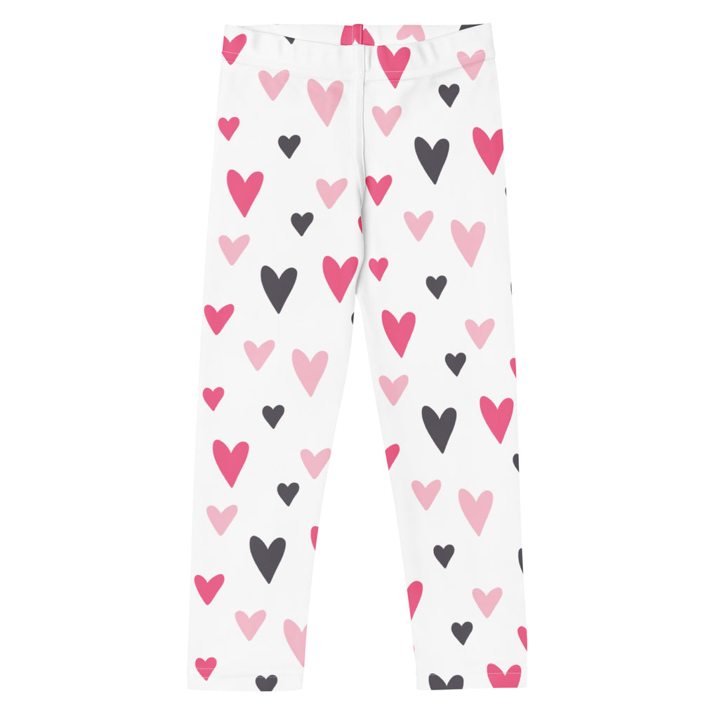 White girls Valentine’s Day leggings with playful pink and black heart pattern in buttery soft fabric