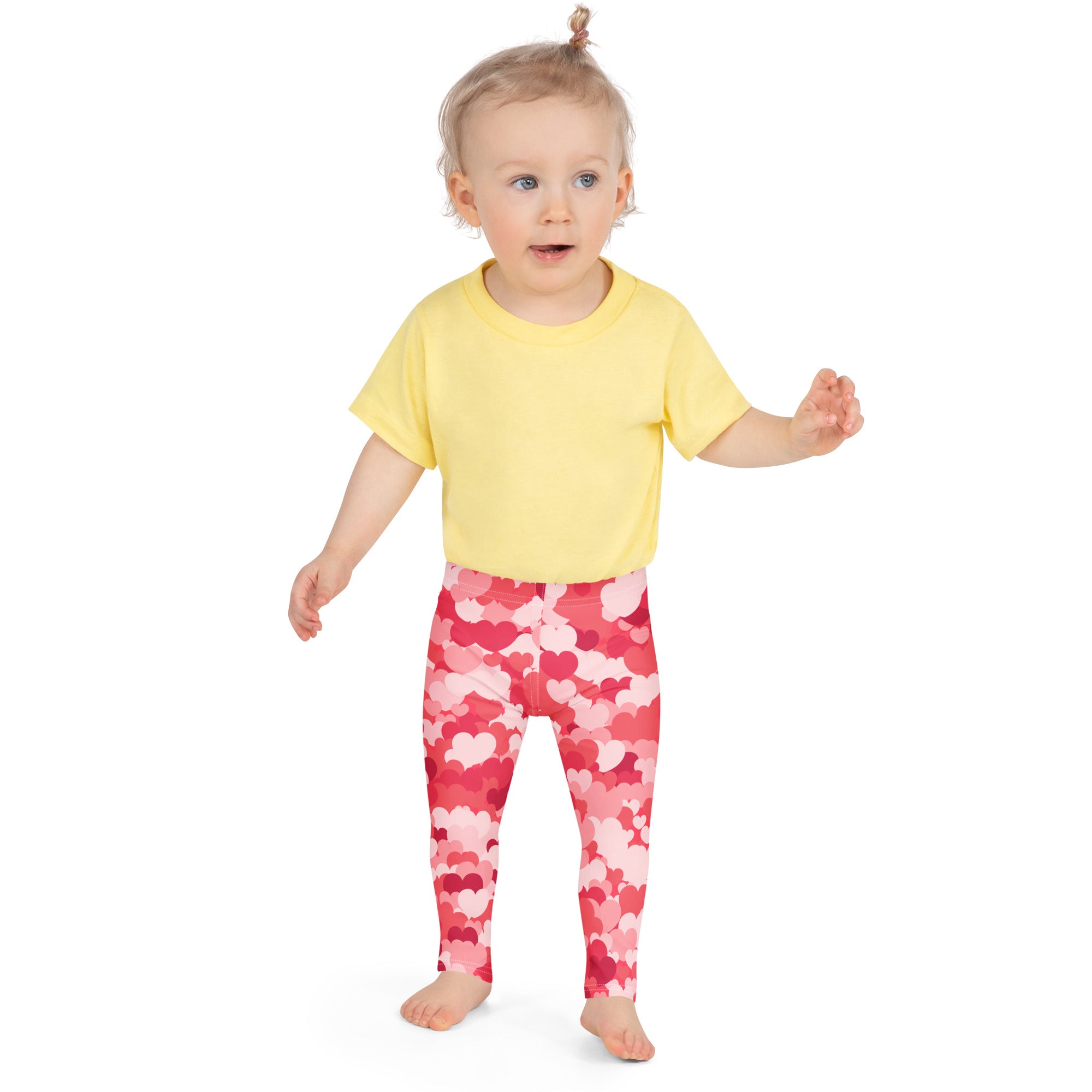 Girls pink heart cloud leggings in buttery soft fabric with pink and red heart patterns for comfortable wear