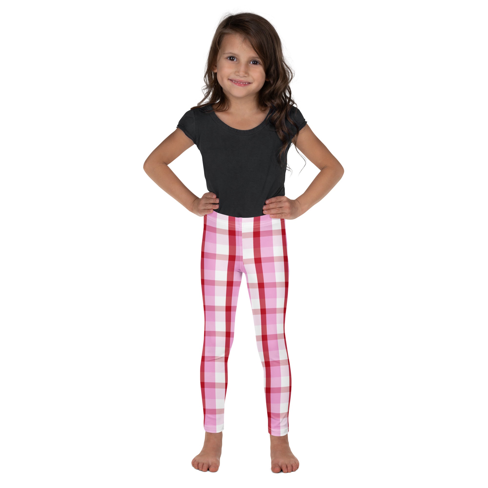 Girls pink and red plaid leggings featuring a fitted stretchy design in buttery soft fabric for comfortable wear